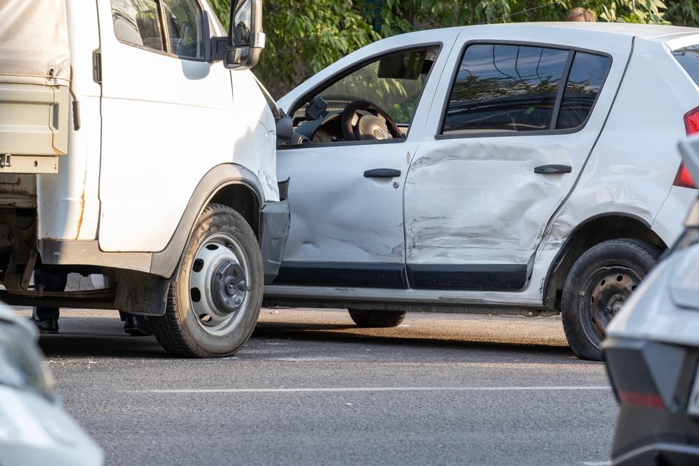 An accident between a truck and a car leaves the car owner wondering what to do after an accident with a DHL truck.