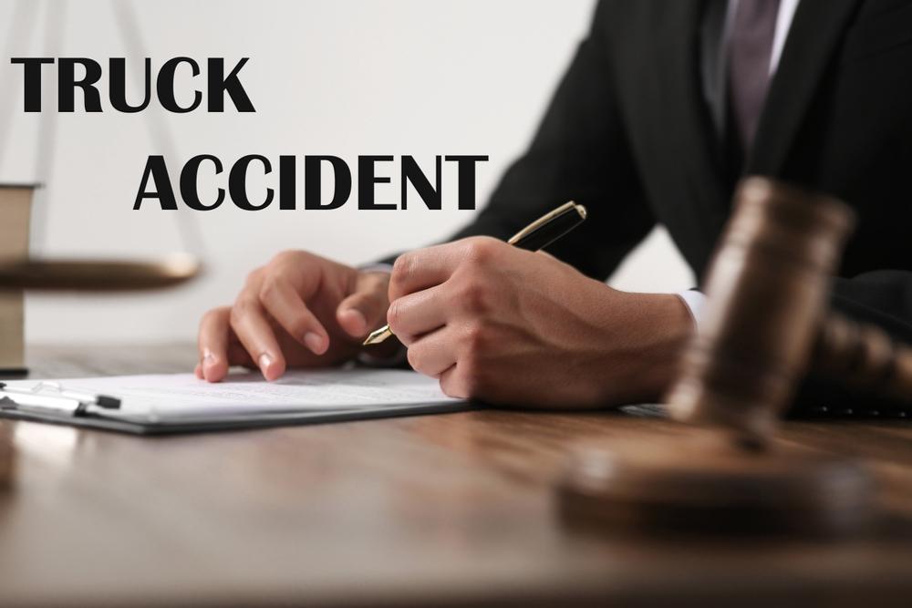 A person meeting with a lawyer after a truck accident in North Carolina.
