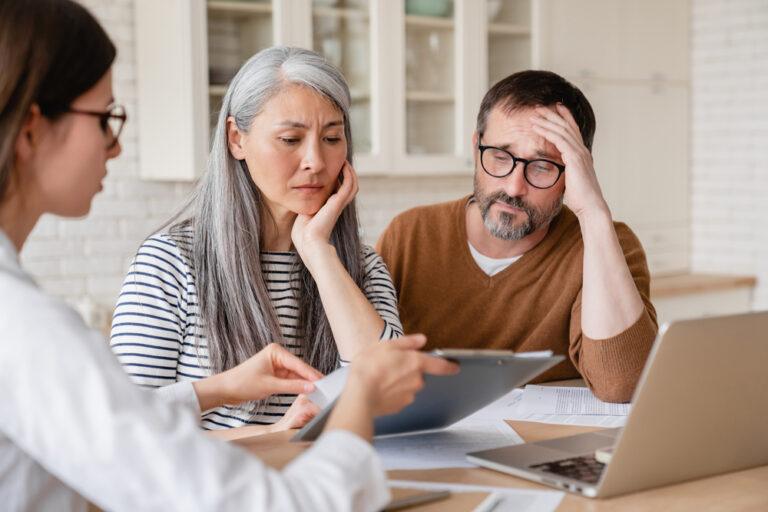 A lawyer explains the statute of limitations to her clients after they ask her, “How long do I have to file a car accident claim in North Carolina?”