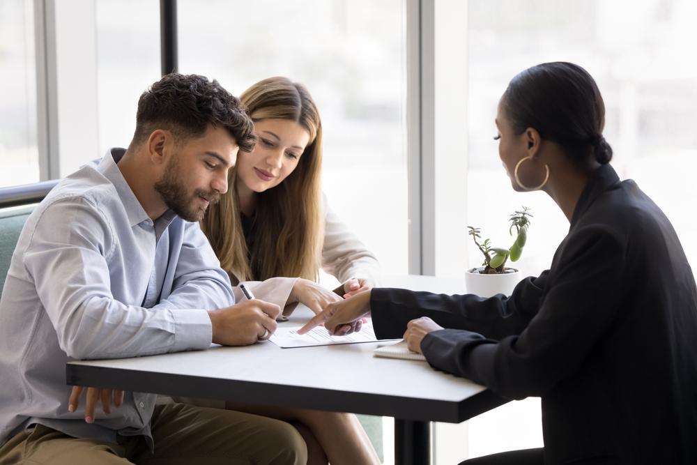 A personal injury attorney walks her clients through a list of the signs of a brain injury after an accident.