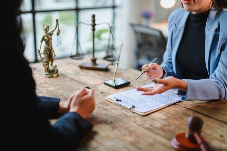 A lawyer who is explaining the chances of winning a truck accident claim.
