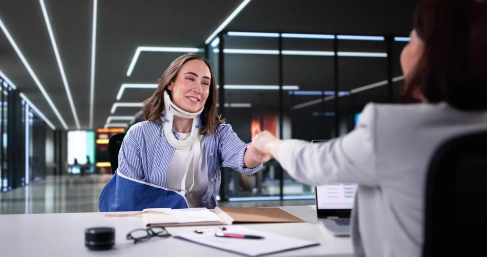 Lawyer meets with client to explain what to do after an injury at a basketball game in North Carolina.