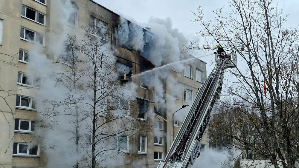A fireman battles a fire on a ladder as tenants wonder if they can sue the apartment complex for a fire.