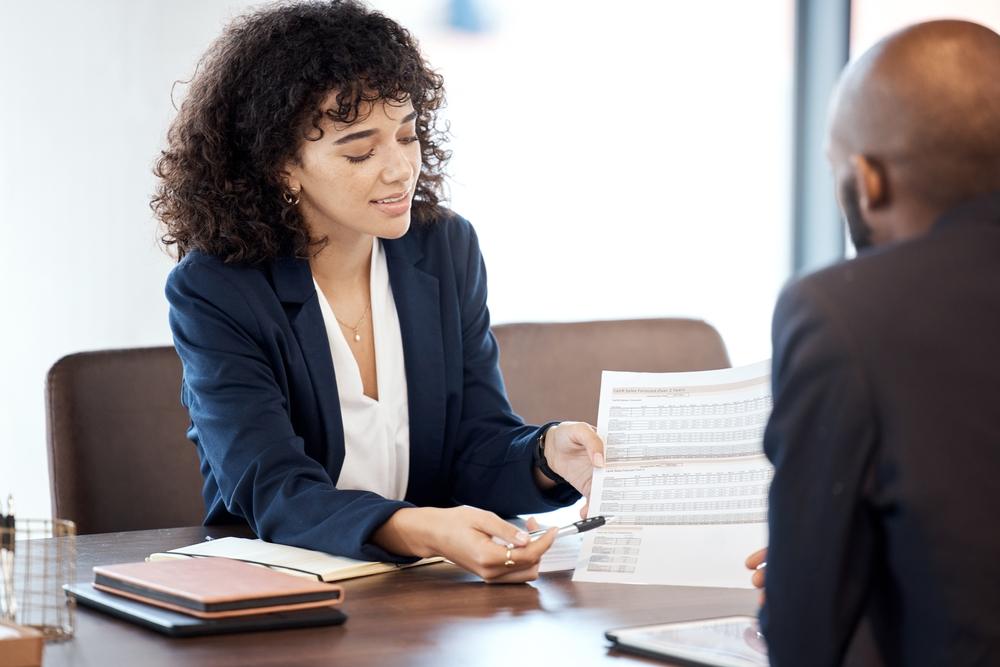 An attorney takes the time to show her client how to get a crash report in Wilmington, NC.