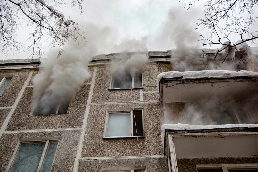 An apartment building on fire. A lawyer can explain what happens if your apartment burns down.