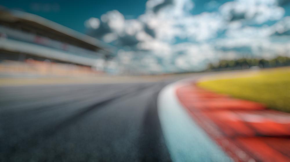 A blurred image of the Charlotte Motor Speedway after someone was injured at a race