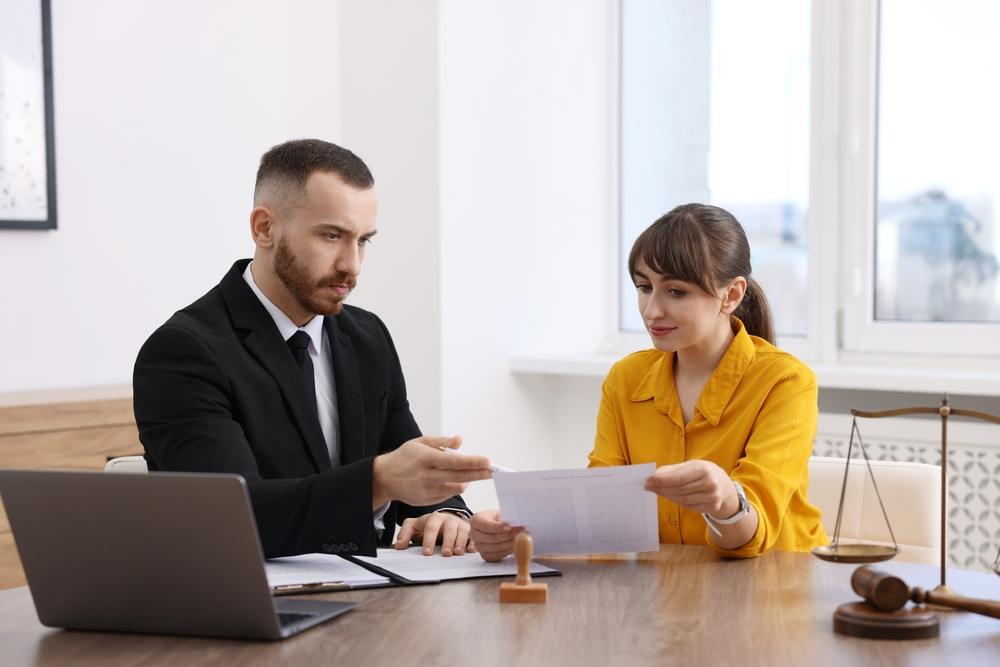 An attorney speaks with her client about when a written boating accident report is required.